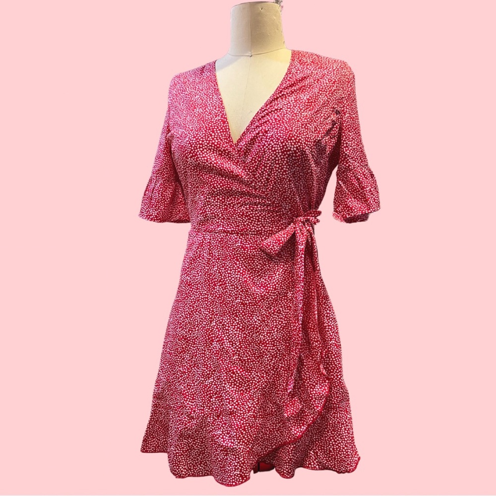 Red polka dot mini wrap dress with ruffle sleeves